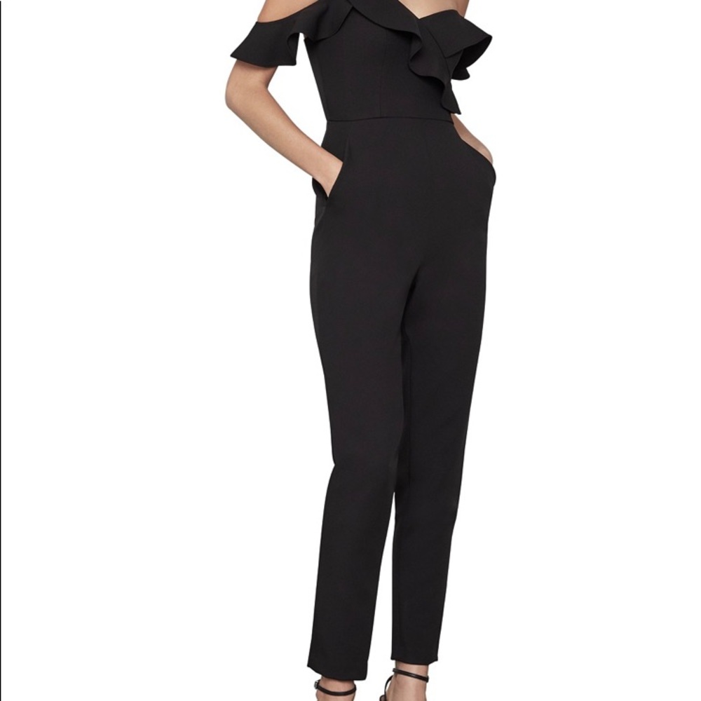 Cause a sensation in this striking one-shoulder jumpsuit from BCBGMAXAZRIA